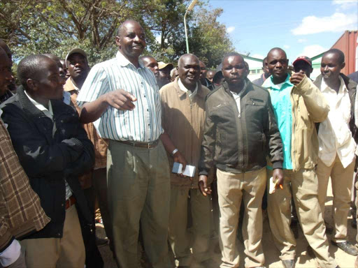 WE NEED TO PLANT: KFA director Kipkorir Menjo address- es farmers at NCPB depot in Eldoret town on Tuesday.