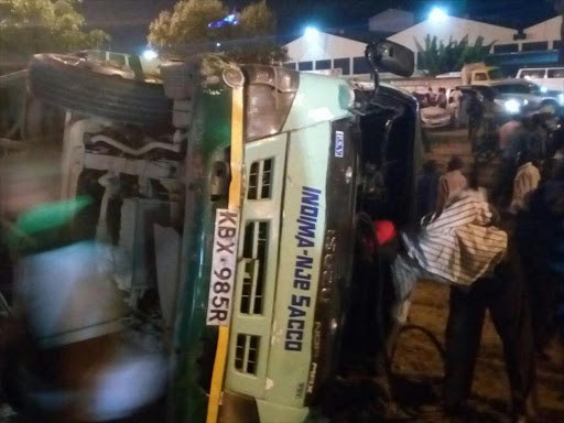 The bus that rolled near Standard group offices along Mombasa road.Photo/Courtesy