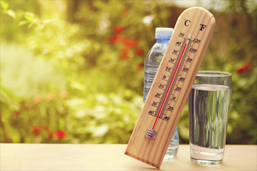 Thermometer on summer day showing near 45 degrees - Stock