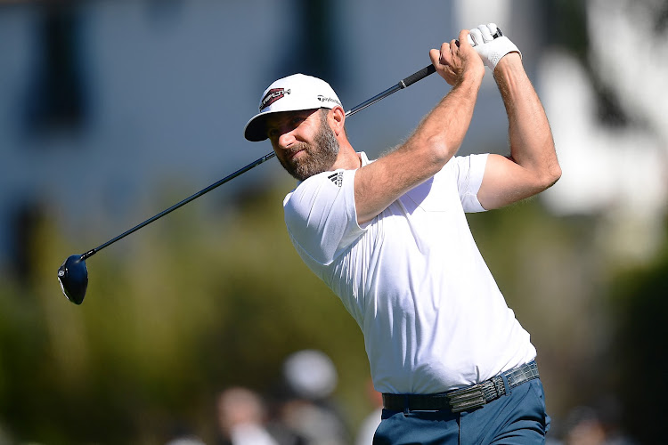 Dustin Johnson hits from the second tee during the first round of the Genesis Invitational golf tournament