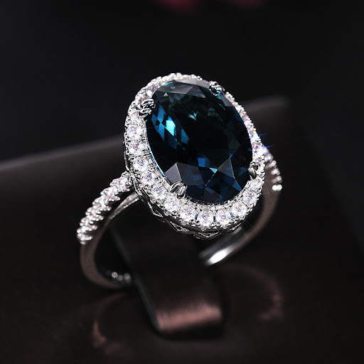 Title 1, Womens Peacock Blue Zircon Ring. A stunning pi...