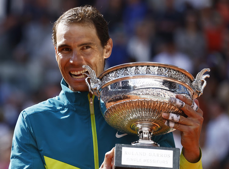 Spain's Rafael Nadal celebrates with the trophy after winning the French Open