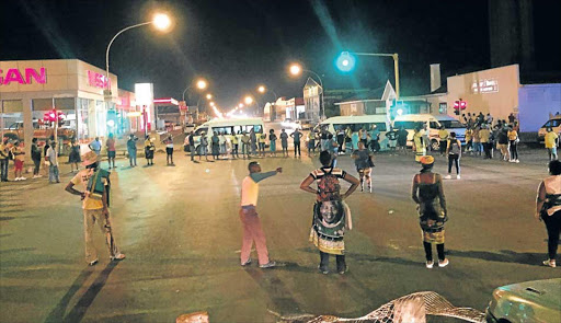 BIG BLOW: More than 100 ANC supporters were left stranded for hours in King William's Town on Tuesday night after eight taxis were not paid their money to ferry them home to the Kidds Beach area following the Human Rights Day event Picture: BONGANI FUZILE