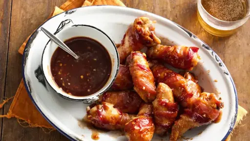 Chicken Wings In Schezwan Sauce (6 Pcs)