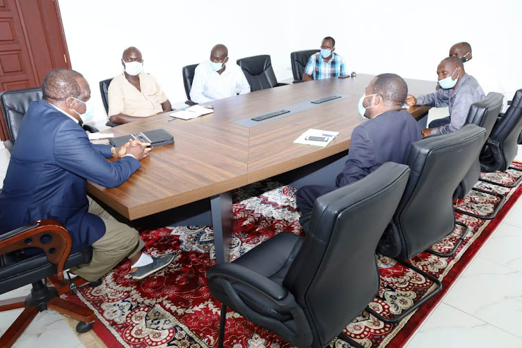 Kakamega Governor and CoG chairman Wycliffe Oparanya during a meeting with officials from the Greater Busoga Sugar Cane Growers Cooperative Union in his boardroom on Friday, August 21, 2020