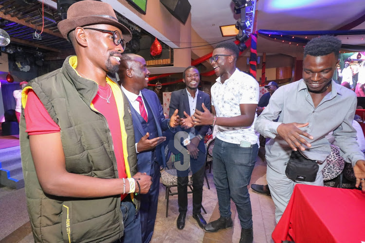 Men dancing during Men's conference at Carnivore, Nairobi on February 14.