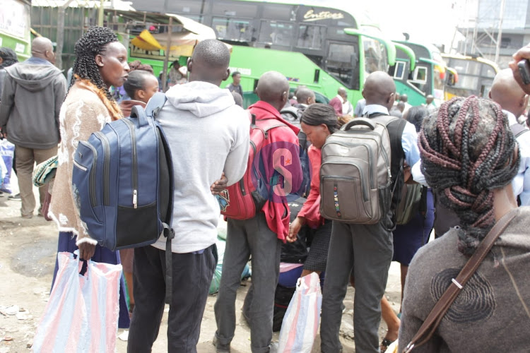 Students at Country Bus station awaiting for matatus as they re-open for third term on August 29, 2023.