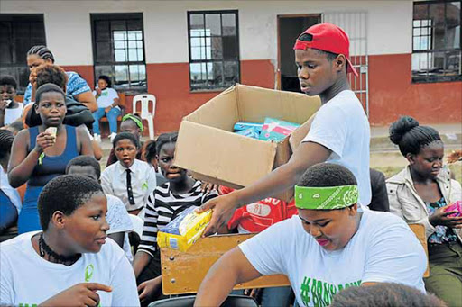 The "#Keepagirlinschool sanitary pad drive kicked off in Ulwazi secondary school in Mdantsane today[Friday]. All 458 girls in the school each received a pack of sanitary towels. picture supplied