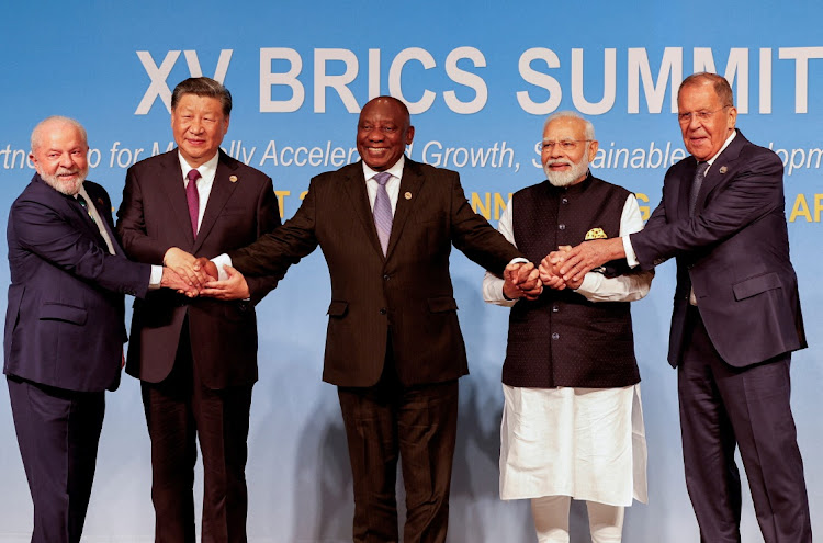 President of Brazil Luiz Inacio Lula da Silva, President of China Xi Jinping, South African President Cyril Ramaphosa, Prime Minister of India Narendra Modi and Russia's Foreign Minister Sergei Lavrov pose for a BRICS family photo during the 2023 BRICS Summit at the Sandton Convention Centre in Johannesburg, South Africa, on August 23, 2023. Picture: GIANLUIGI GUERCIA via REUTERS