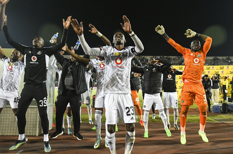 Orlando Pirates players celebrate with their supporters after winning their MTN8 quarterfinal against Royal AM at Chatsworth Stadium on August 27 2022.