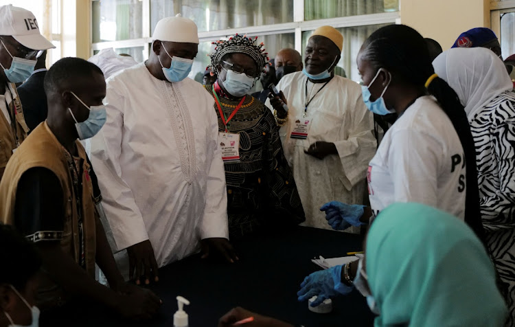 Gambia's President Adama Barrow arrives to vote during the presidential election, in Banjul, Gambia, December 4, 2021.