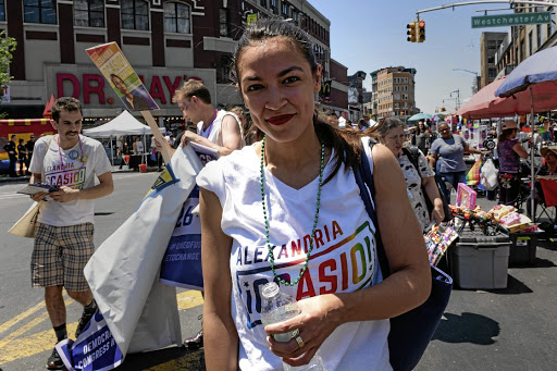 Alexandria Ocasio-Cortez marches during the Bronx’s pride parade in New York City. Picture: REUTERS