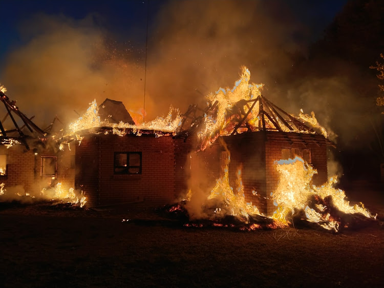 Firefighters struggled to put out the blaze, which destroyed nearly all of the home's contents.