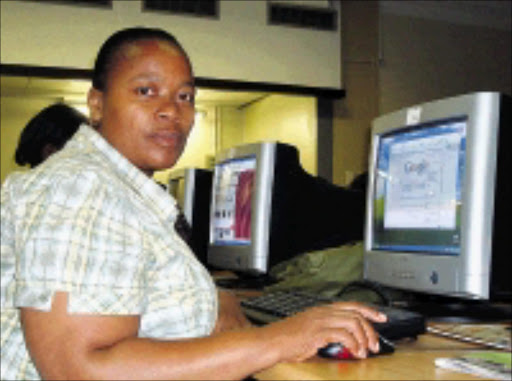 EMPOWERED: Zodwa Mbambo is one of the teachers who are being trained by the University of KwaZulu-Natal in basic computer kills. 08/04/09. Pic. Sne Masuku. © Sowetan.