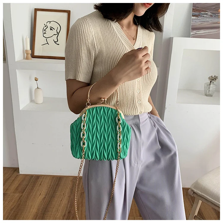 Clip chain bag for secure and stylish everyday carry. Elegant design with a practical clip closure, perfect for keeping 