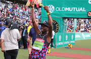 Bongmusa Mthembu celebrates winning the 2018 Comrades Marathon, 2018.