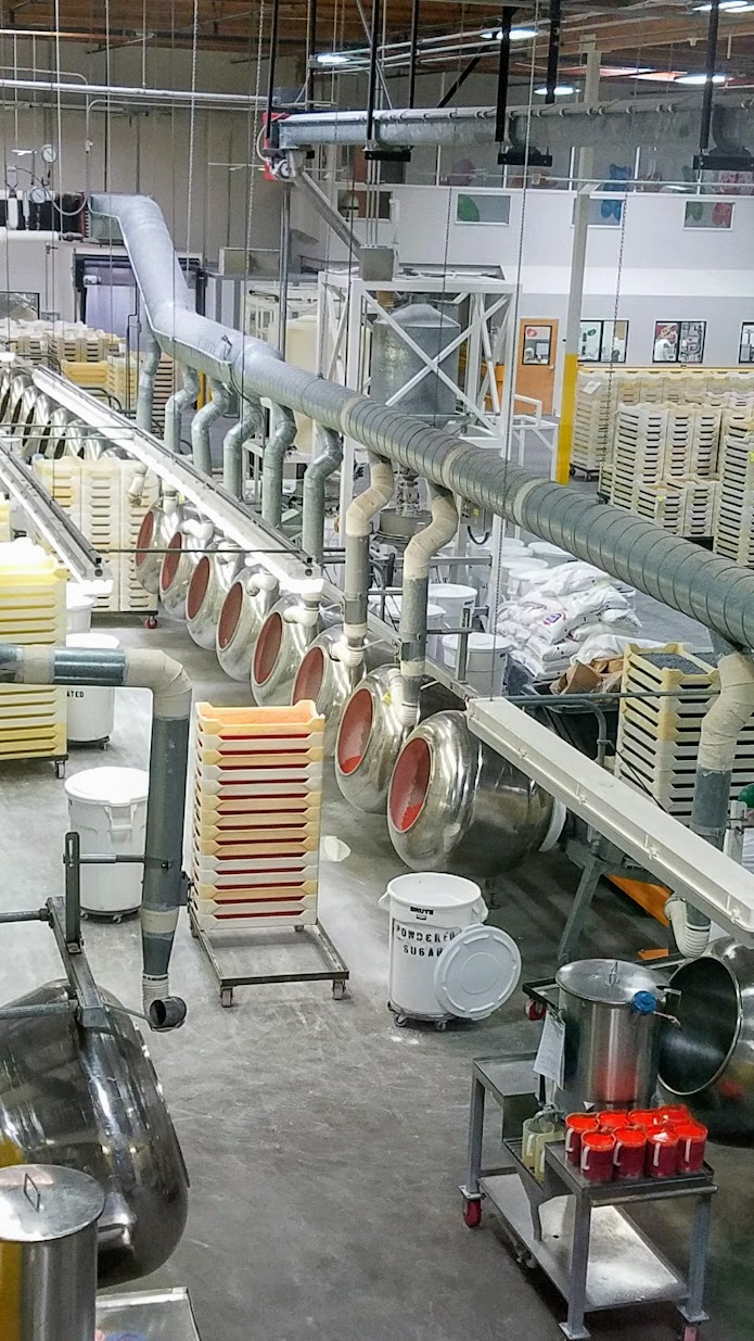 Jelly Belly Factory Tour in Fairfield, California: man and machine working together to make Jelly Belly into production and sale