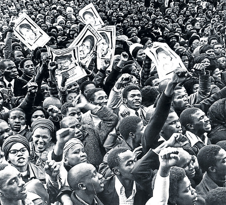 Black South Africans at the funeral service of anti-apartheid activist Steve Biko