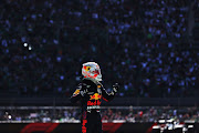 Race winner Max Verstappen celebrates in parc ferme during the F1 Grand Prix of Mexico at Autodromo Hermanos Rodriguez on November 7 2021 in Mexico City, Mexico.