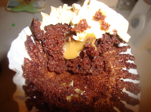 Chocolate cupcakes with creamy peanut butter filling and smooth whipped peanut butter frosting 