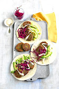 Harissa falafel wraps with quick-pickled cabbage - one of the colourful recipes in Prue Leith's latest cookbook, 'The Vegetarian Kitchen'.