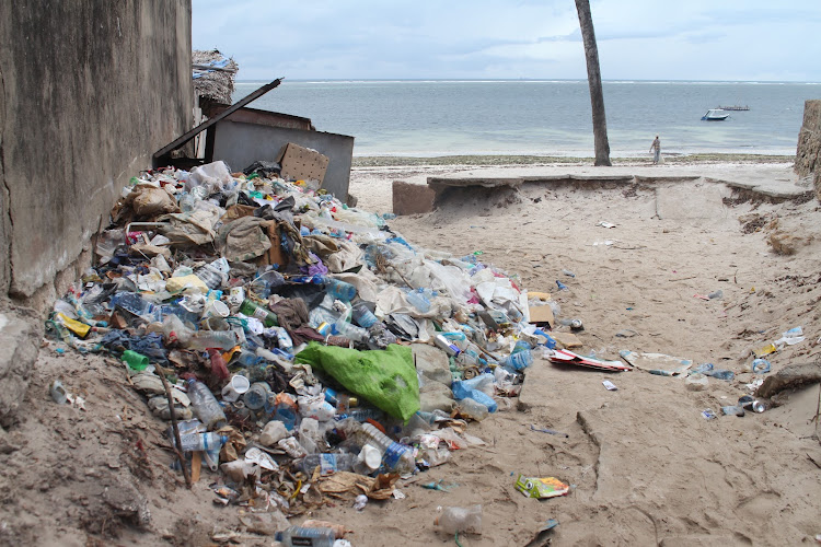 Trash including polythene and plastics at the entrance of Mombasa beach, Mombasa county, on April 12