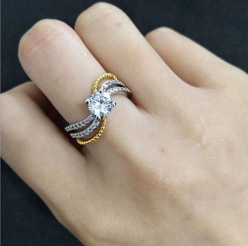 Anillo bicolor de circonita microincrustada de moda creativa para mujer, accesorio nuevo y transfronterizo, diseño elegante y llamativo.