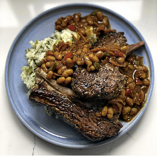 Zola Nene’s lamb chops with isigwamba and chakalaka.