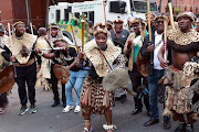 Group of Amabutho, gathered outside Pretoria High Court pledging support to King Misuzulu Zulu. 