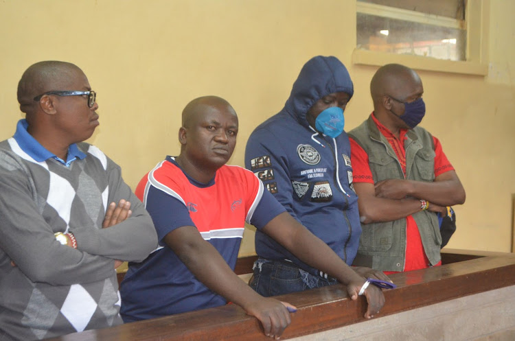 The four accused during their sentencing at a Wang'uru court