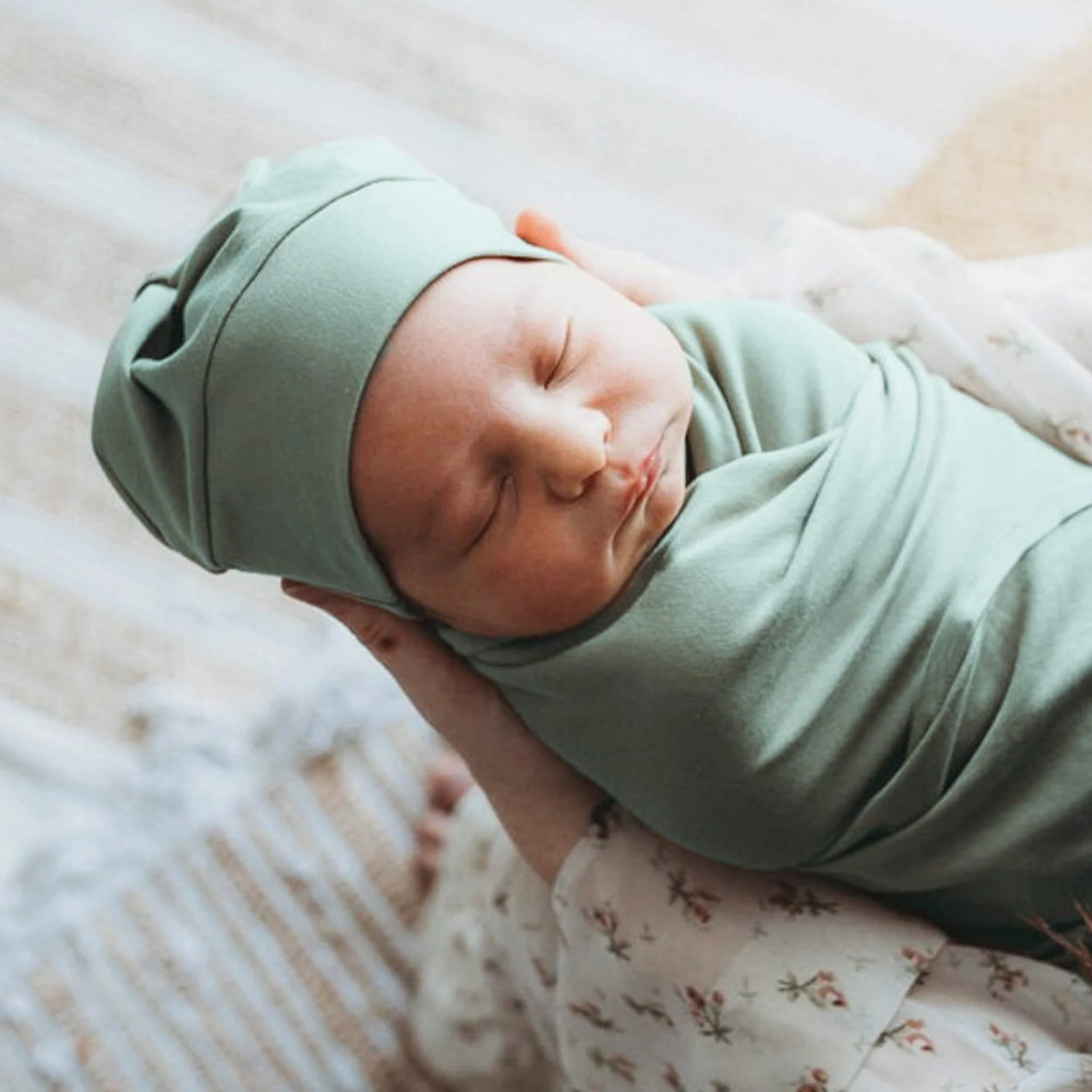 Title 27, Newborn baby wraparound cloth with printed rabb...