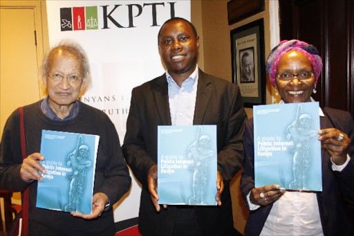 Renowned Constitutional lawyer Yash Pal Ghai, Katiba Institute executive director Waikwa Wanyoike and Executive Director, Gladwell Otieno