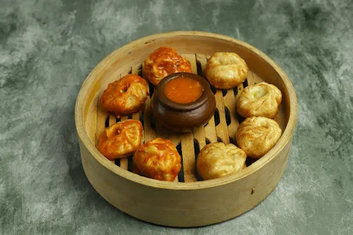 Veg Schezwan Fried Momos (3pcs) with Veg Fried Momos (3pcs)