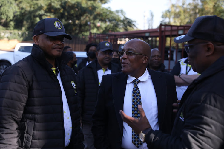 Home affairs minister Aaron Motsoaledi attended the raid in Marabastad.