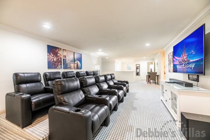 Upstairs home cinema room with large flatscreen TV