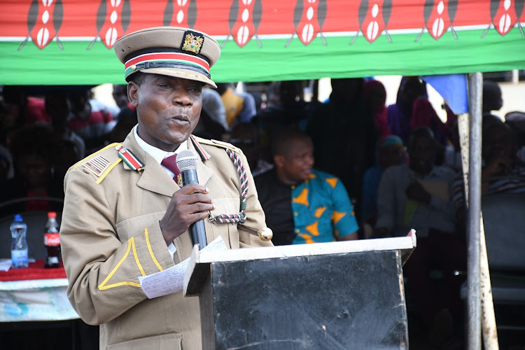 Kinang deputy county commissioner Charles Akwanalo at the Madaraka Day celebrations at Tsunza secondary school on Thursday.