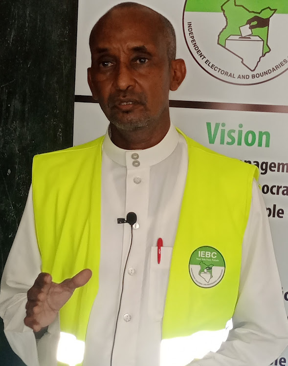 Garissa election manager Hussein Gurre speaking to the press in his office on Wednesday, January 26.