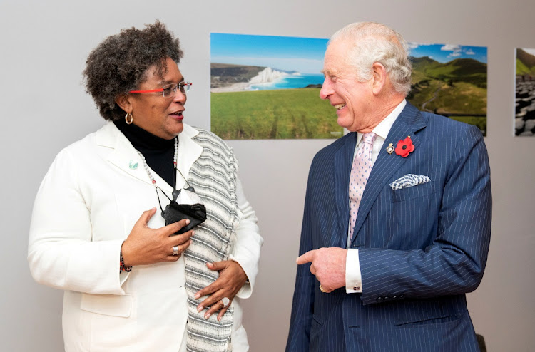 Barbados' Prime Minister Mia Amor Mottley and Prince Charles at the COP26 conference on November 2 2021. Picture: JANE BARLOW via REUTERS