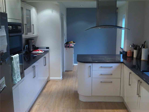 take out load bearing walls and replace kitchen and flooring