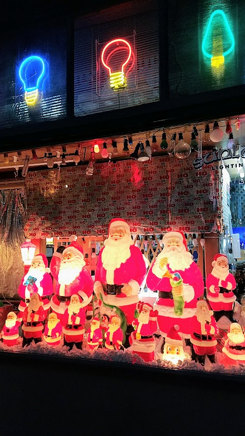 Snowman vs Santa - are you #TeamSnowman or #TeamSanta #illuminatedpdxmas2017 at the All American Holiday Window Display