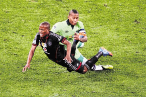 GOING ALL OUT: Platinum Stars skipper Vuyo Mere fouls Orlando Pirates' Thabo Matlaba during their MTN8 final at Moses Mabhida stadium in Durban Photo: Anesh Debiky/Gallo Images