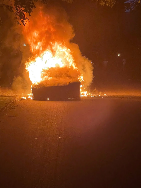 Tesla Inc's new Model S Plaid electric car is seen in flames in Pennsylvania, US, in this handout photo provided to Reuters on July 2, 2021.