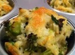 Baked Cheddar-Broccoli Rice Cups was pinched from <a href="http://www.daydreamkitchen.com/2012/08/baked-cheddar-broccoli-rice-cups/" target="_blank">www.daydreamkitchen.com.</a>