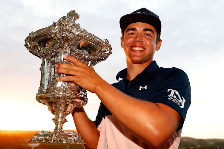 Garrick Higgo of South Africa poses with the trophy following his victory in the Portugal Open at Royal Obidos Spa & Golf Resort on September 20, 2020 in Obidos