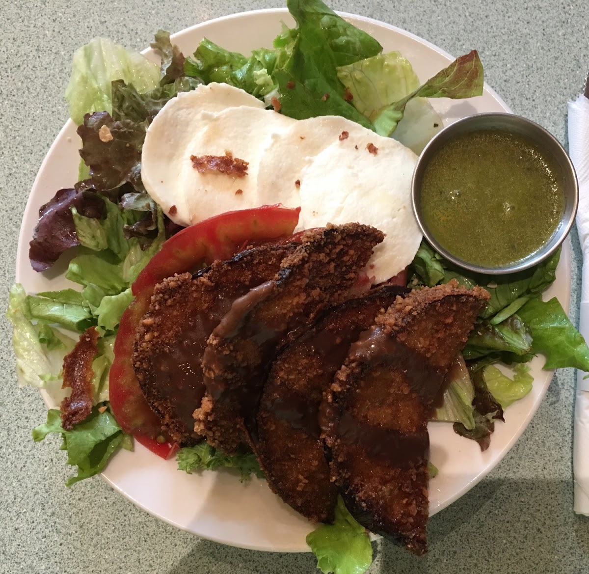 Mediterranean Salad. Fried eggplant, mozzarella, heirloom tomatoes and greens with basil vinaigrette.