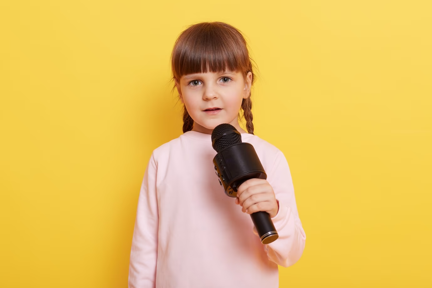 A little girl giving a speech