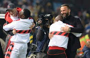 TS Galaxy coach Sead Ramovic celebrates with his staff members during their DStv Premiership match against Mamelodi Sundowns at Loftus Versfeld Stadium on August 10, 2022 in Pretoria, South Africa.