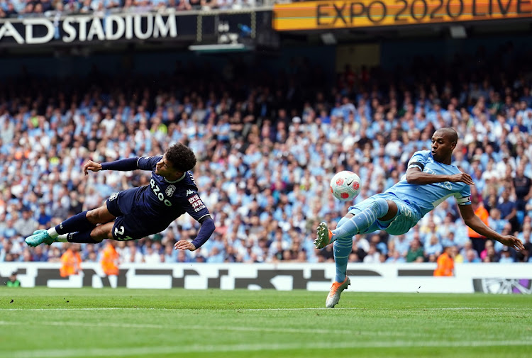 Aston Villa's Philippe Coutinho (left) and Manchester City's Fernandinho (right) during the Premier League match at Etihad Stadium in Manchester on May 22 2022.