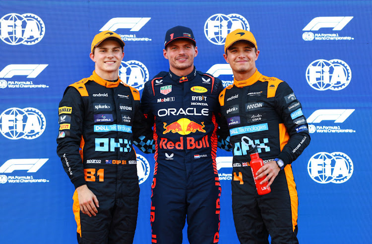 Formula One championship leader Max Verstappen (centre) put Red Bull on pole position for the Japanese Grand Prix. McLaren's Oscar Piastra (left) was second and his teammate Lando Norris (right) third.