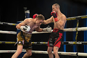 Boyd Allen and Brandon Thysse in action during the WBA Pan African Junior Middleweight title bout of the Back 4 Battle Event at Emperors Palace on October 10, 2020 in Johannesburg, South Africa.